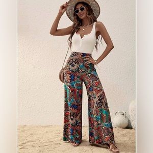 Truth women’s size large all over print wide, leg pants with tie belt